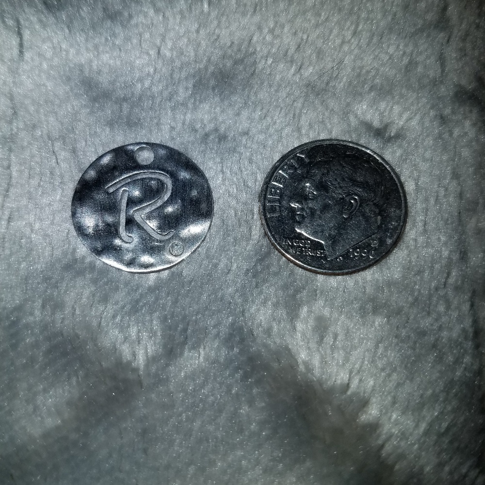 Sterling silver "R" sand dollar pendant